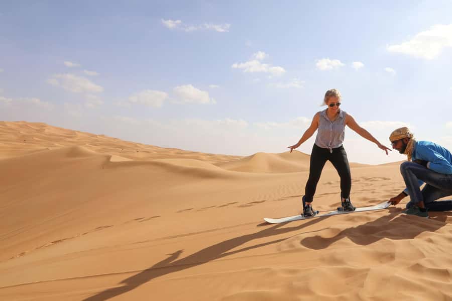 Abu Dhabi: Desert Safari, Quad Bike, Camels & Sandboarding - Sandboarding on the dunes