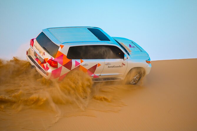 Abu Dhabi Evening Desert Safari - Dune bashing Camel ride and BBQ - What dune bashing feels like in a Land Cruiser