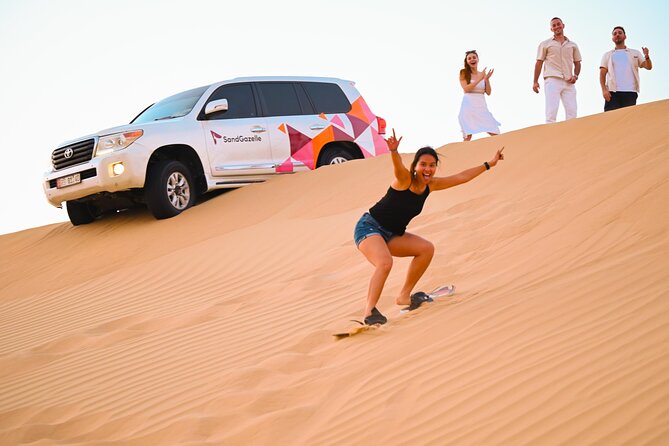 Abu Dhabi Evening Desert Safari - Private car Dune bashing & BBQ - A camel farm visit with time for photographs