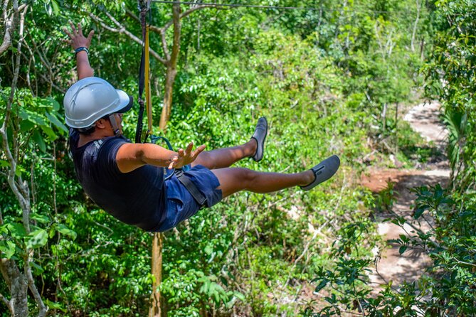 Action-packed Cancun ATV tour, Ziplines, Cenote, Lunch and More - Swimming in a Natural Cenote
