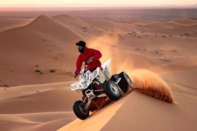 Adventurous Red Dune Desert Safari Deal with Quad Bike,Shows &BBQ - Camel rides and sandboarding
