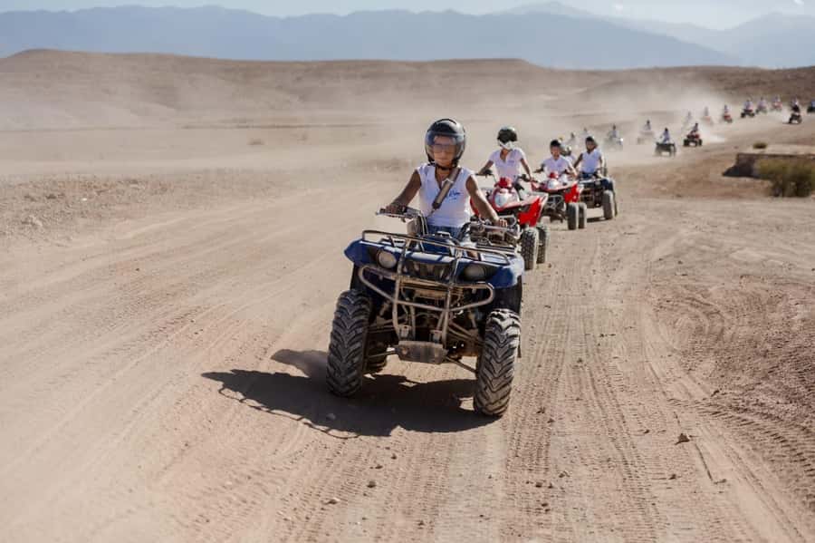 Agafay Desert: Quad, Camel Ride & Luxury Lunch with Pool - Camel riding at a slower pace