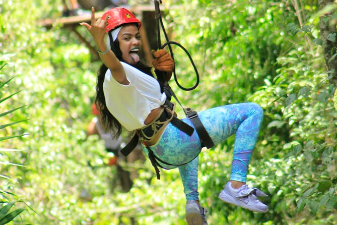 Amazing ATV Tour, Ziplines and Cenote Swim with Lunch and round trip included - Zip lines through the treetops