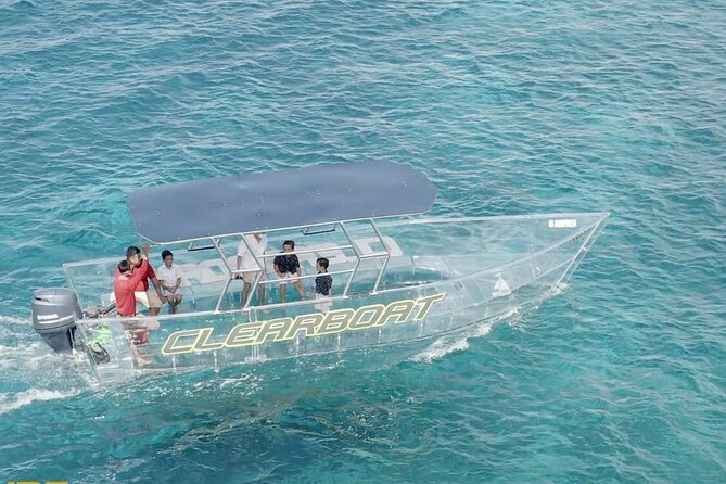 ATV and Clear Boat Ride Full Experience in Cozumel - Tequila tasting with a sales pitch nearby