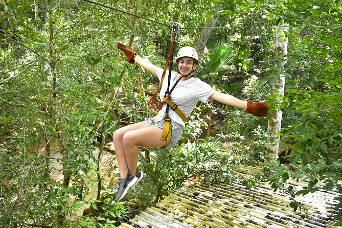 ATV Jungle Adventure with Ziplines, Cenote & Transportation - Swimming in cenote Verde Lucero