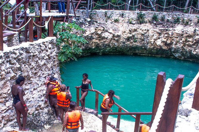 ATV's (shared), Ziplines & Cenote! Half-Day with Transportation from Cancun - Cool water at the cenote