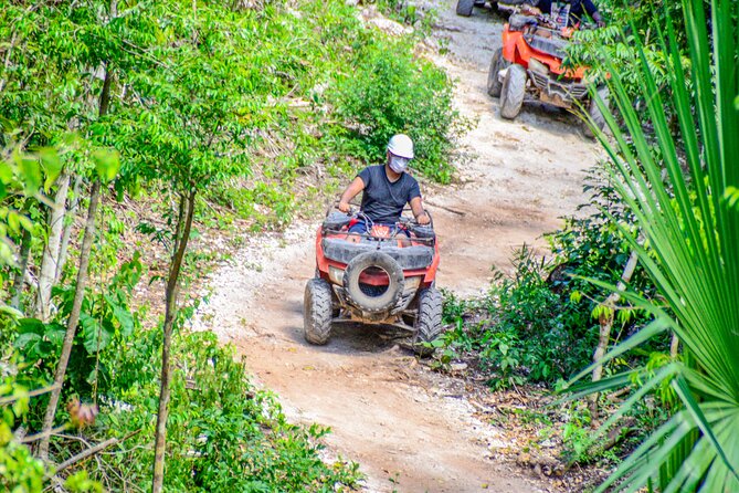 ATV Tour, Ziplines and Cenote with Lunch and Transportation - ATV riding on jungle trails
