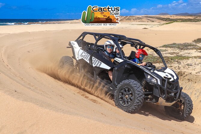 Beach UTV Adventure with Free Camel and Horseback Ride - UTV driving across dunes and desert trails