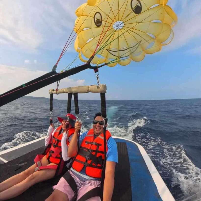 Boracay: Parasailing, Island Hopping, ATV Ride and Kawa Bath - Parasailing above Boracay’s white sand