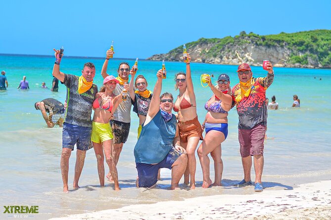 Buggy Tour Punta Cana: MagicalCaves ,Dream Beaches & Culture - Macao Beach: waves, sand, and a useful rinse
