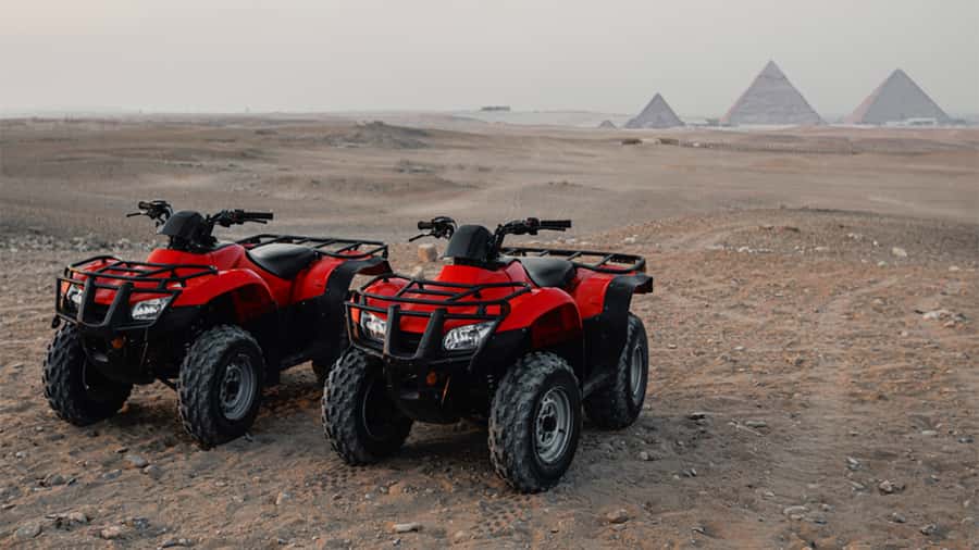 Cairo: Private Quad Bike Desert Tour with Pyramids & Sunset - Sunset, camels, and the cultural program