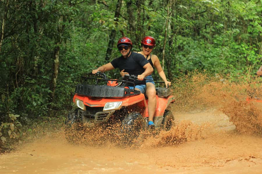 Cancún: ATV, Zipline, and Cenote Adventure with Lunch - Ziplining above the tree canopy