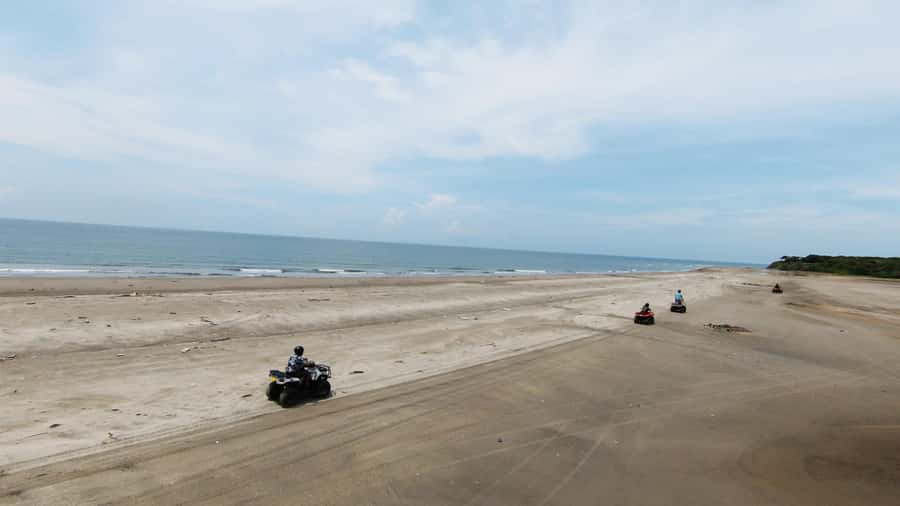 Cartagena ATV Tour - Beach riding with Cartagena in the distance
