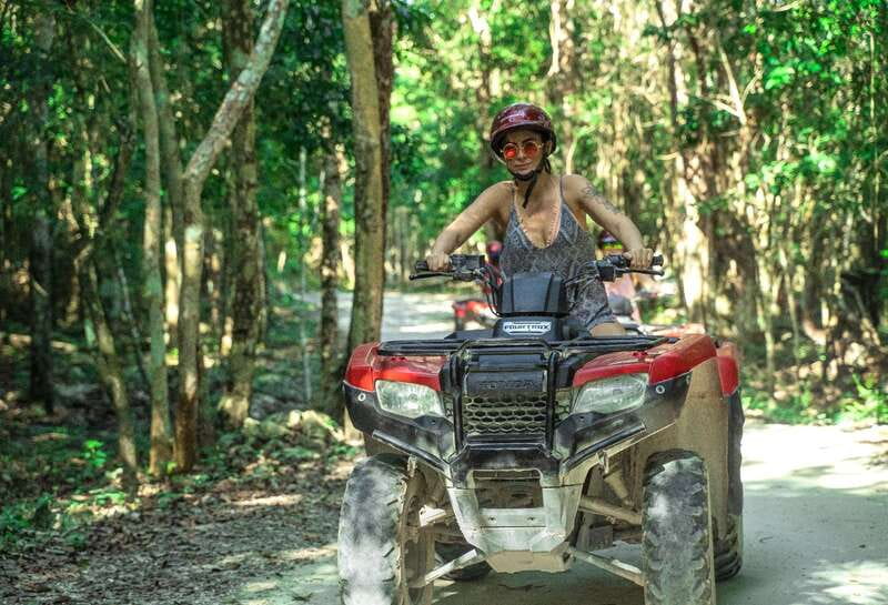 Cozumel: ATV Ride to Jade Cavern, Beach Club Access & Lunch - Riding a Honda 250 through the jungle