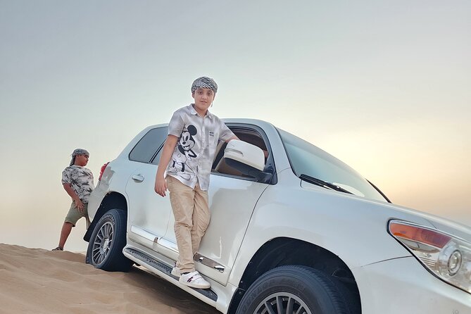 Desert Safari BBQ Dinner, Live Shows, ATV Bikes, Sandboarding - Sandboarding and the 25-minute ATV ride