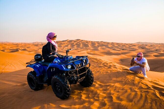 Desert Safari Dubai 30 Mins Quad Bike, Sand Board, Camel Ride BBQ - Sunset photographs among the wide dunes