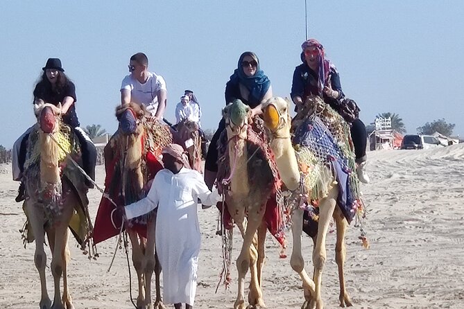Desert Safari, Quad Bike, Sandboarding and Camel Ride - The Inland Sea is the visual reward