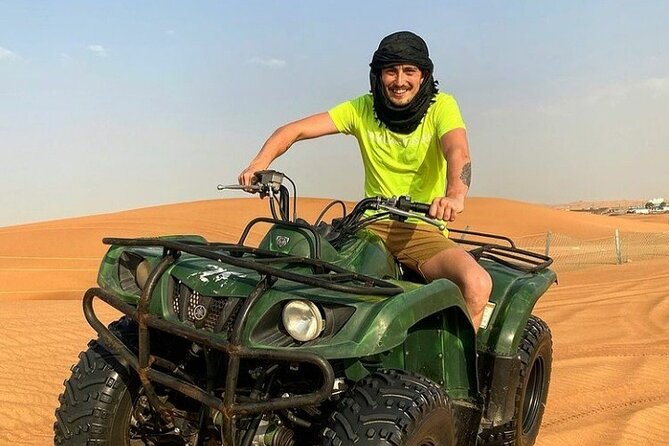Desert Safari, Quad Biking, Sand Surfing and BBQ Dinner In Dubai - From Dubai hotels to the red dunes of Lahbab