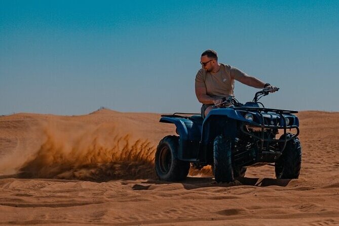 Desert Safari with 30 Minutes Quad Biking on High Red Dunes (Complete Package) - Ten minutes on the dunes for sunset photos