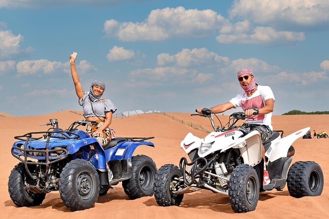 Desert Safari with 30 Minutes Quad Biking on High Red Dunes (Complete Package) - BBQ buffet dinner and three live shows