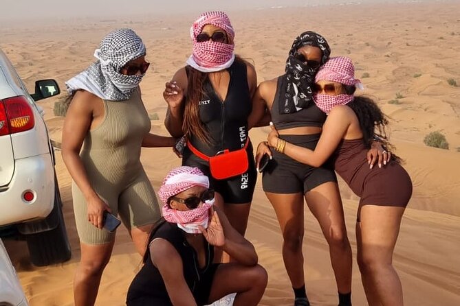 Desert Safari With BBQ Dinner, Quad Bike & Camel Ride from Dubai - Dinner on carpets and pillows