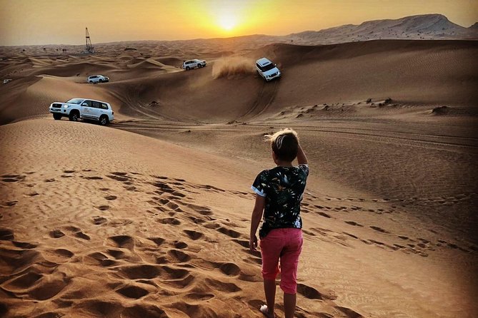 Desert Safari With BBQ Dinner, Quad Ride And And Sand-boarding - Dune bashing in a Land Cruiser