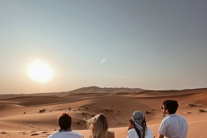 Desert Safari with Quad Bike Camel ride ,SandBoarding ,InalndSea - Tea, coffee, camels, and your first desert stop