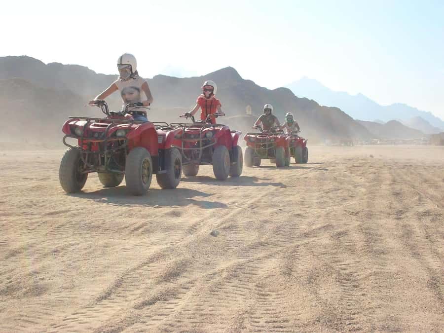 Desert Sunset Quad Bike ATV for 50Km, Oriental Show, Dinner, - Learning to ride before the 25 km route