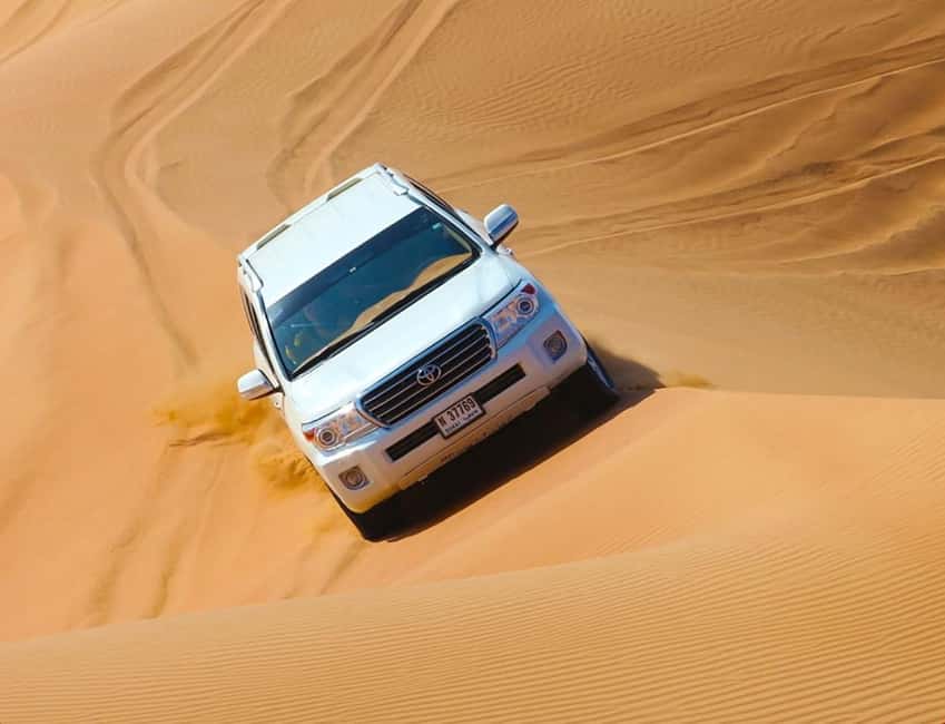 Doha: ATV, Quad or Buggy, Dune Bashing, Camel & Sandboarding - Tea and a Bedouin-style camp