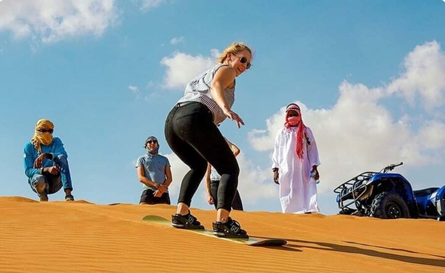 Doha: ATV, Quad or Buggy, Dune Bashing, Camel & Sandboarding - Pickup from Doha and the ride to the sand