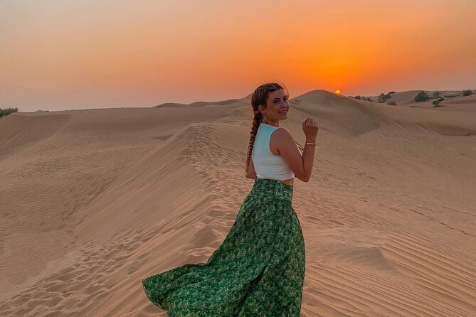 Doha Desert Adventure, Sandboarding, Dune Bashing,Inland Sea Tour - Sandboarding from a high dune