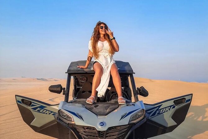 Doha Desert Safari Camel Ride Dune Bashing and ATV Bike - ATV biking and sandboarding add the hands-on fun