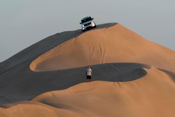 Doha: Desert Safari | Camel ride | Sand-boarding | Quad Biking - Sandboarding on the dunes