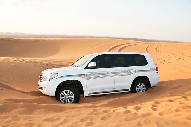 Doha Desert Safari Dune Bashing Camel Ride Sandboarding - Inland Sea Beach, where sand meets the Gulf