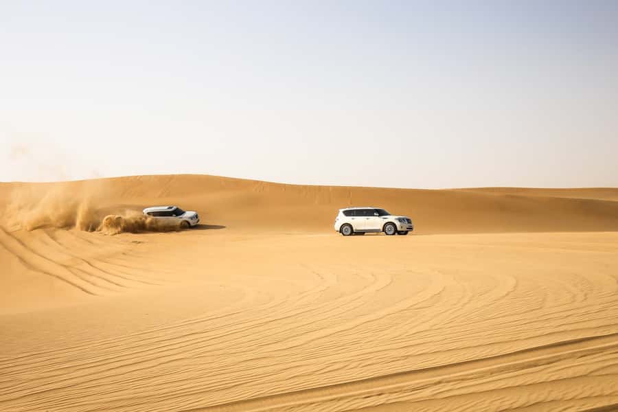 Doha: Desert Safari Dune Bashing, Sandboarding, & Camel Ride - Who should book this experience?