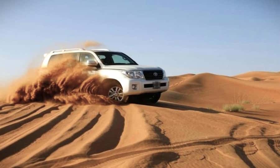Doha: Desert Safari, Dune Bashing, Sandboarding, Camel Ride - Dune Bashing in a Toyota 4WD