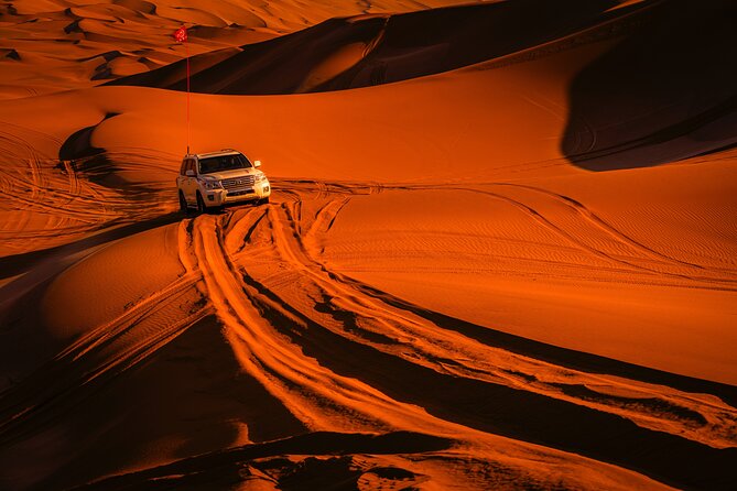 Doha Desert Safari Dune bashing,Sandboarding,CamelRide,Inland Sea - Sandboarding on the Dune Slopes