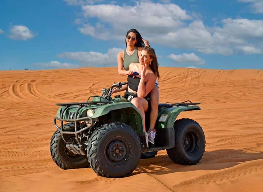 Doha: Desert Safari, Quad Bike, Camel Ride & Inland Sea Tour - Sandboarding on the final dunes