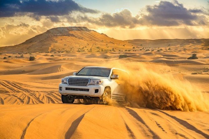 Doha :Half Day Desert Safari | Camel Riding | ATV | Sand Surfing - Dune bashing: the loud, fast part
