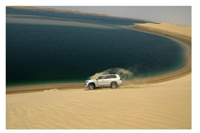 Doha Half Day Desert Safari Dune Bashing CamelRide & Sandboarding - The photo stop and inland sea views