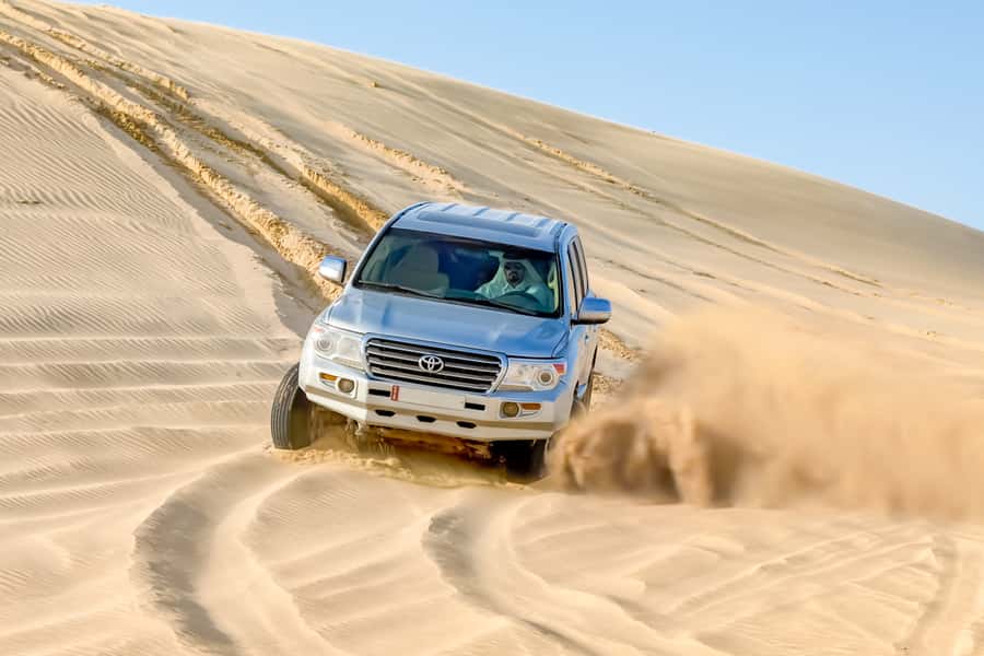 Doha: Half-Day Desert Safari, Quad Bike, Camels & Inland Sea - Camel rides and the limits of a short stop