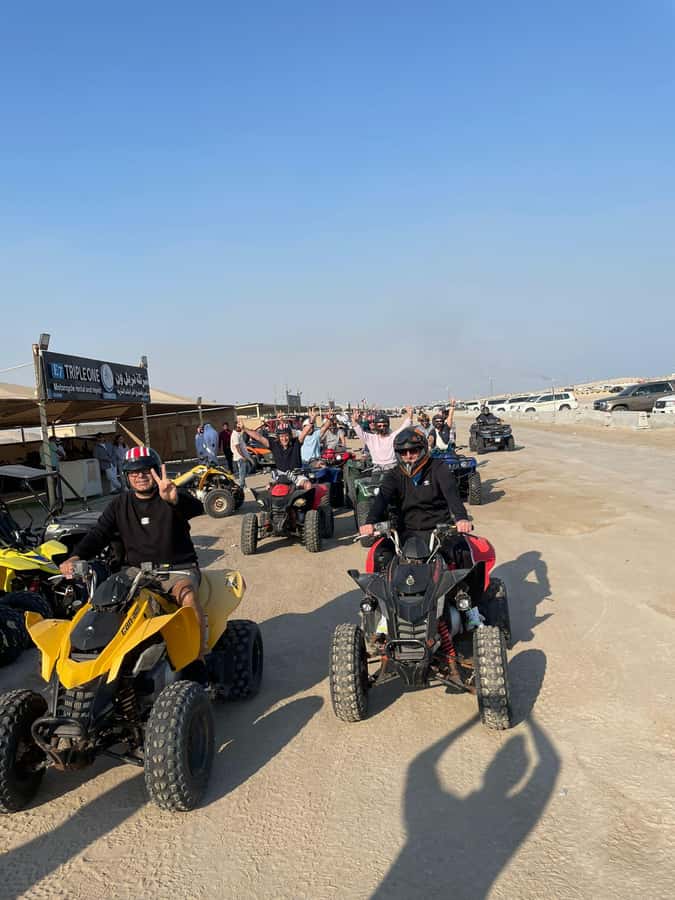 Doha: Quad Bike, Desert Safari, Buggy ride & inland sea tour - Sandboarding near the Inland Sea