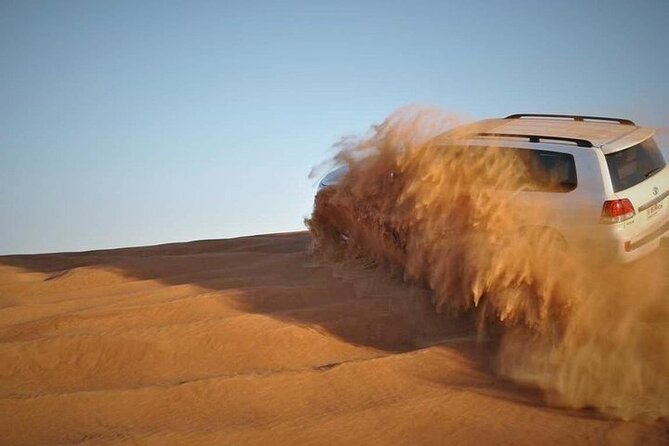 Doha: Quad Bike, Dune Bashing, Camel Ride & Inland Sea Tour - Leaving Doha for Mesaieed in a 4WD