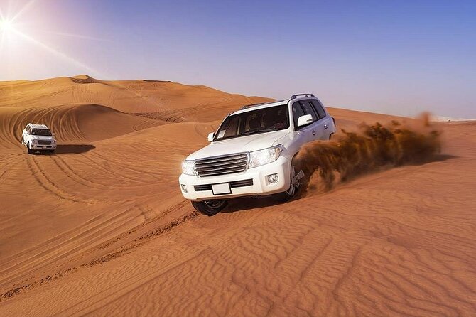 Doha: Quad Bike, Dune Bashing, Camel Ride & Inland Sea Tour - Dune bashing in a Toyota 4WD