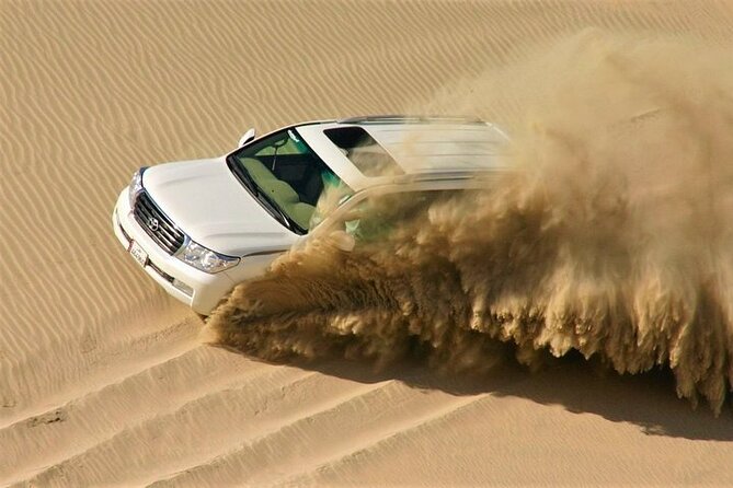 Doha: Quad Bike, Dune Bashing, Camel Ride & Inland Sea Tour - Quad biking on the approved desert tracks