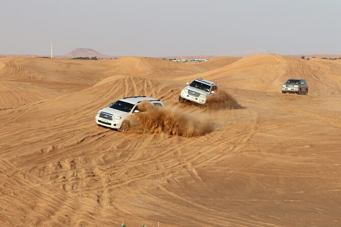 Doha Sharing Desert Safari with Dune Bashing and Sand Boarding - Sealine Beach and the Switch to Sand Driving
