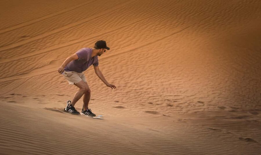 Doha: Sunset Desert Safari, ATV, Camel Ride and Sandboarding - What $58 gets you
