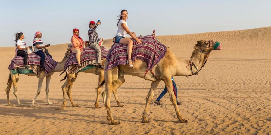 Doha: Sunset Desert Safari, ATV, Camel Ride and Sandboarding - Heat, clothing, and practical comfort