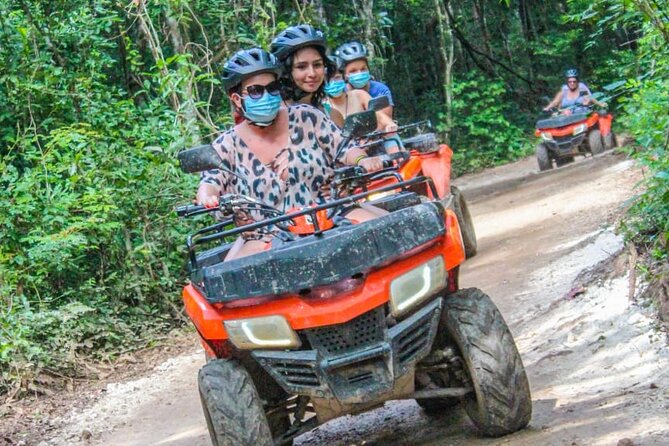 Drive an Atv shared, swim in a Cenote and ziplines in the Cancun - Food, photos, and extra charges