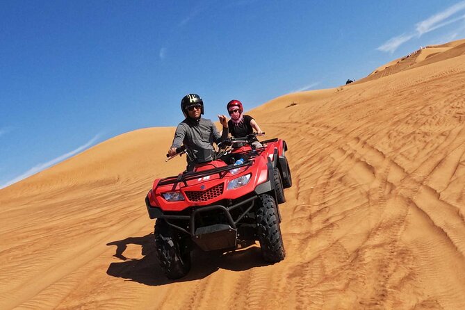 Dubai: Buggy Dune Bashing, Sand Boarding, Camel Ride & Show - The desert camp, BBQ, and evening entertainment
